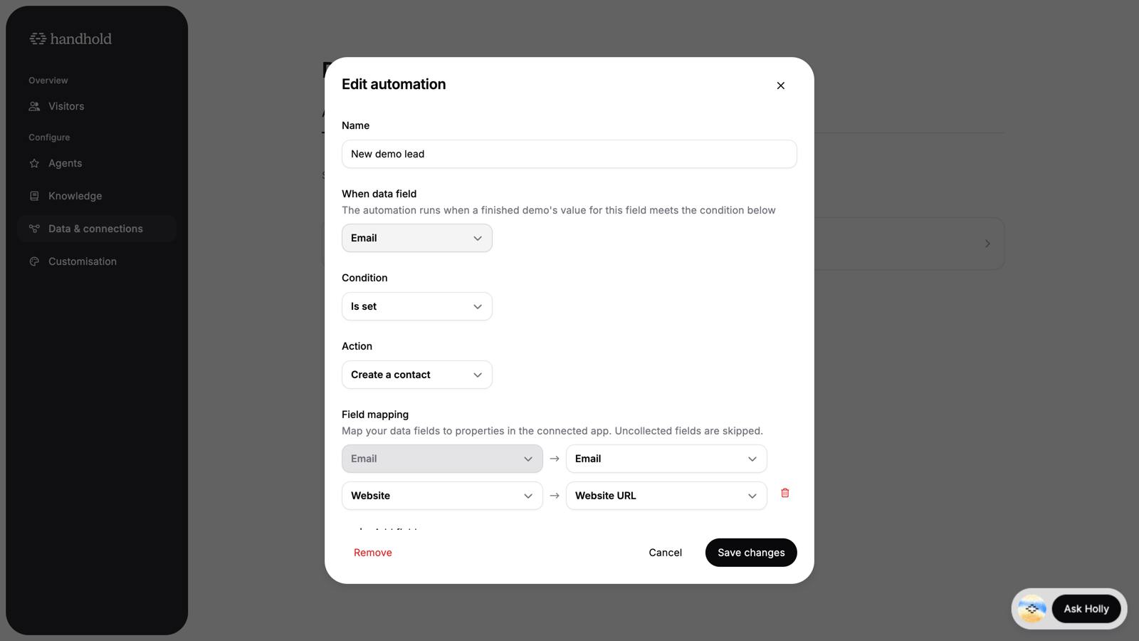 Handhold automation editor mapping demo data fields to HubSpot contact properties
